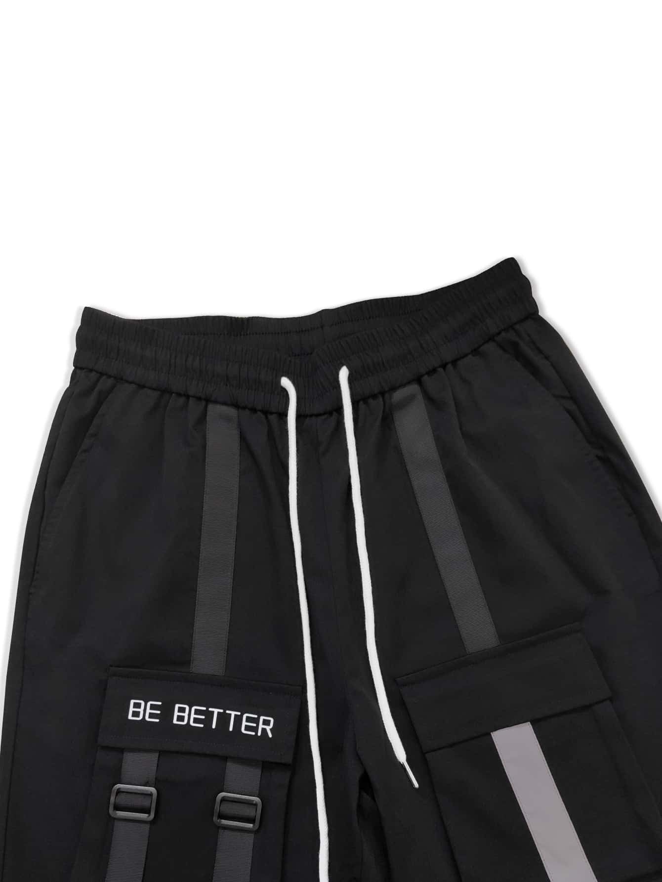 Manfinity EMRG Men Slogan Graphic Buckle Detail Flap Pocket Drawstring Waist Cargo Pants, Street Wear Long Black Pants, for Husband, Boyfriend Gifts, Black Cargo Pants Men, Multi Pocket Cargo Pants Men, Baggy Cargo Pants, Streetwear Cargo Pants
